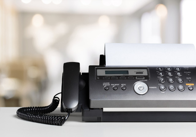 Mend fax machine paper